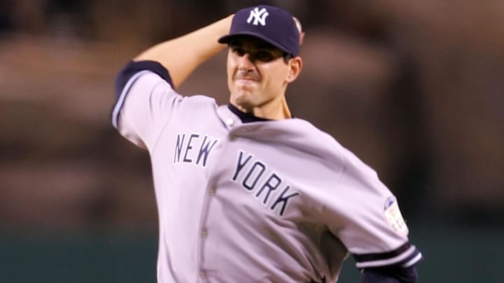 September 8, 2008; Anaheim CA, USA; New York Yankees starting pitcher Carl Pavano (45) pitches in the third inning against the Los Angeles Angels at Angel Stadium of Anaheim. Mandatory Credit: Gary A. Vasquez-Imagn Images