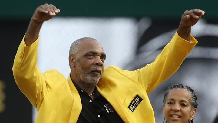 Sep 3, 2022; Pittsburgh, Pennsylvania, USA; Pittsburgh Pirates former right fielder Dave Parker gestures his hands as if they were Cobra snakes during his induction into the Pirates Hall of Fame in a ceremony prior to a game against the Toronto Blue Jays at PNC Park. Mandatory Credit: Charles LeClaire-Imagn Images