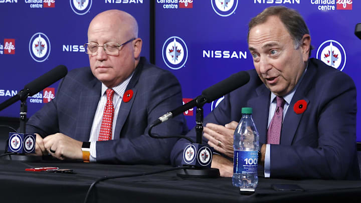 Nov 8, 2022; Winnipeg, Manitoba, CAN; NHL Commisioner Gary Bettman and Deputy Commisioner Bill Daly address the media before a game against the Winnipeg Jets and Dallas Stars at Canada Life Centre. Mandatory Credit: James Carey Lauder-Imagn Images