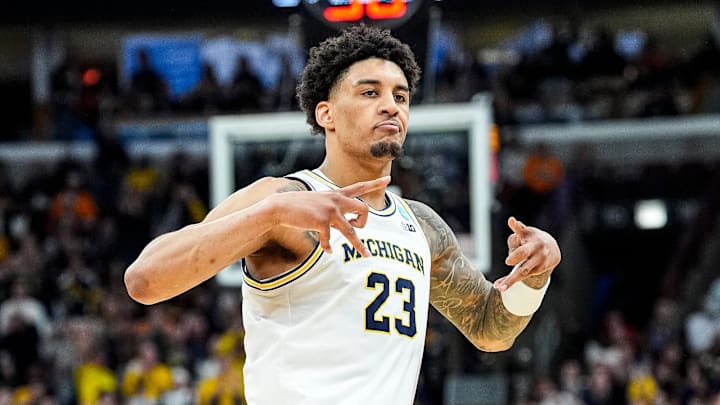 Michigan forward Yaxel Lendeborg (23) celebrates a 3-pointer against Tennessee during the first half of NCAA Tournament Elite 8 round at United Center in Chicago on Sunday, March 29, 2026.