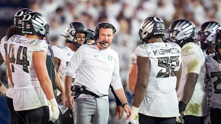 The Man in the Arena: Dan Lanning fires up the defense in the fourth quarter at Penn State.
