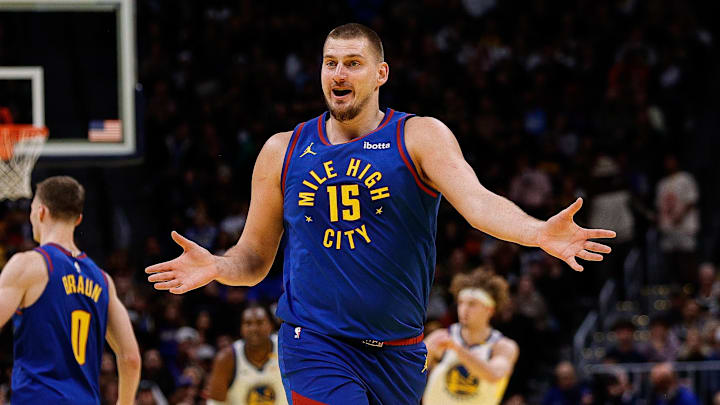 Dec 3, 2024; Denver, Colorado, USA; Denver Nuggets center Nikola Jokic (15) reacts after a play in the second quarter against the Golden State Warriors at Ball Arena. Mandatory Credit: Isaiah J. Downing-Imagn Images