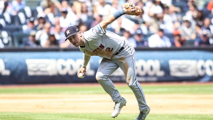 Aug 5, 2023; Bronx, New York, USA;  Houston Astros third baseman Alex Bregman (2) fields the ball in the fifth inning against the New York Yankees at Yankee Stadium.