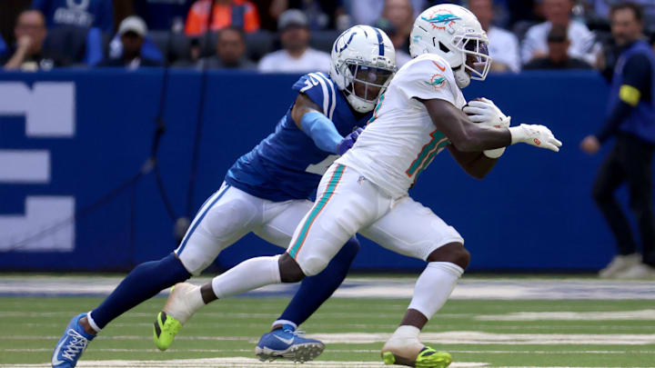 Sep 7, 2025; Indianapolis, Indiana, USA; Miami Dolphins wide receiver Tyreek Hill (10) runs against Indianapolis Colts cornerback Charvarius Ward (7) during the second half at Lucas Oil Stadium. Mandatory Credit: Trevor Ruszkowski-Imagn Images