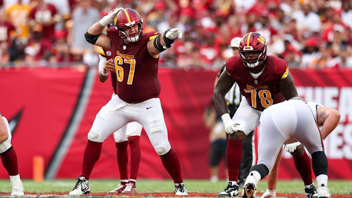 Sep 8, 2024; Tampa, Florida, USA; Washington Commanders guard Nick Allegretti (67) calls a play against the Tampa Bay Buccaneers in the fourth quarter at Raymond James Stadium. Mandatory Credit: Nathan Ray Seebeck-Imagn Images Sep 8, 2024; Tampa, Florida, USA; Washington Commanders guard Nick Allegretti (67) calls a play against the Tampa Bay Buccaneers in the fourth quarter at Raymond James Stadium. Mandatory Credit: Nathan Ray Seebeck-Imagn Images