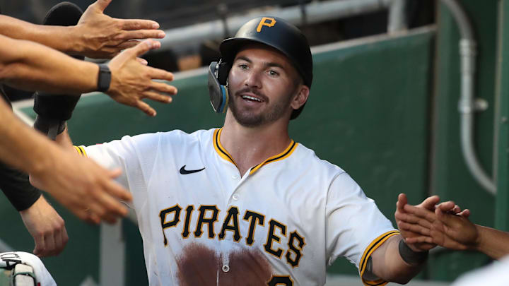 Jul 22, 2025; Pittsburgh, Pennsylvania, USA;  Pittsburgh Pirates first baseman Spencer Horwitz (2) high-fives in the dugout after scoring a run against  the Detroit Tigers during the sixth inning at PNC Park. Mandatory Credit: Charles LeClaire-Imagn Images