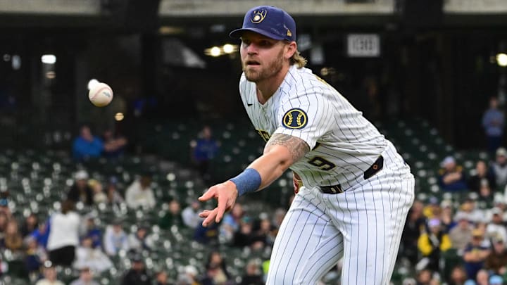 Apr 26, 2026: Milwaukee Brewers first baseman Jake Bauers (9) tosses out Pittsburgh Pirates center fielder Billy Cook (not pictured) in the third inning at American Family Field. 