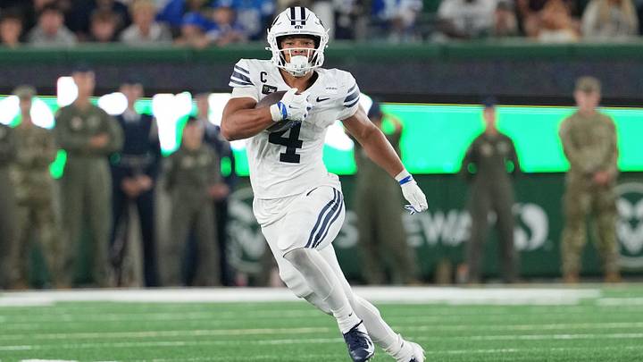 Sep 19, 2026; Fort Collins, Colorado, USA; BYU Cougars running back Lj Martin (4) runs the ball against the Colorado State Rams at Sonny Lubick Field at Canvas Stadium. Mandatory Credit: Andrew Rydland-Imagn Images Sep 19, 2026; Fort Collins, Colorado, USA; BYU Cougars running back Lj Martin (4) runs the ball against the Colorado State Rams at Sonny Lubick Field at Canvas Stadium. Mandatory Credit: Andrew Rydland-Imagn Images