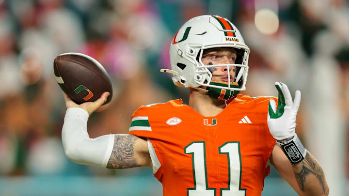 Oct 17, 2025; Miami Gardens, Florida, USA; Miami Hurricanes quarterback Carson Beck (11) throws the football against the Louisville Cardinals during the second quarter at Hard Rock Stadium. Mandatory Credit: Sam Navarro-Imagn Images Oct 17, 2025; Miami Gardens, Florida, USA; Miami Hurricanes quarterback Carson Beck (11) throws the football against the Louisville Cardinals during the second quarter at Hard Rock Stadium. Mandatory Credit: Sam Navarro-Imagn Images