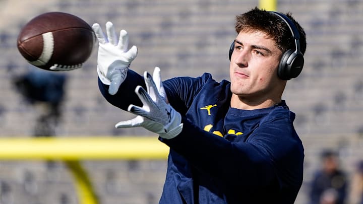 Michigan tight end Colston Loveland (18) warms up before the Oregon game at Michigan Stadium in Ann Arbor on Saturday, Nov. 2, 2024. Michigan tight end Colston Loveland (18) warms up before the Oregon game at Michigan Stadium in Ann Arbor on Saturday, Nov. 2, 2024.