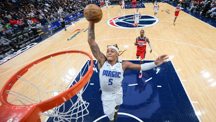 Orlando Magic forward Paolo Banchero (5) dunks the ball during the third quarter against the Washington Wizards at Capital One Arena.