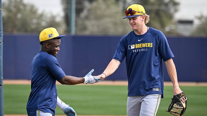 Milwaukee Brewers outfielder Luis Lara and infielder Cooper Pratt come off the field together during spring training workouts Monday, February 17, 2025, at American Family Fields of Phoenix in Phoenix, Arizona.