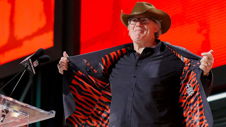 Former Cincinnati Bengals defensive lineman Tim Krumrie shows off the tiger-striped lining of his suit before announcing the team’s selection with the 49th overall pick during the second round of the 2025 NFL Draft on Friday, April 25, 2025, at Lambeau Field in Green Bay, Wisconsin. The draft runs through April 26.
Tork Mason/USA TODAY NETWORK-Wisconsin Former Cincinnati Bengals defensive lineman Tim Krumrie shows off the tiger-striped lining of his suit before announcing the team’s selection with the 49th overall pick during the second round of the 2025 NFL Draft on Friday, April 25, 2025, at Lambeau Field in Green Bay, Wisconsin. The draft runs through April 26.
Tork Mason/USA TODAY NETWORK-Wisconsin