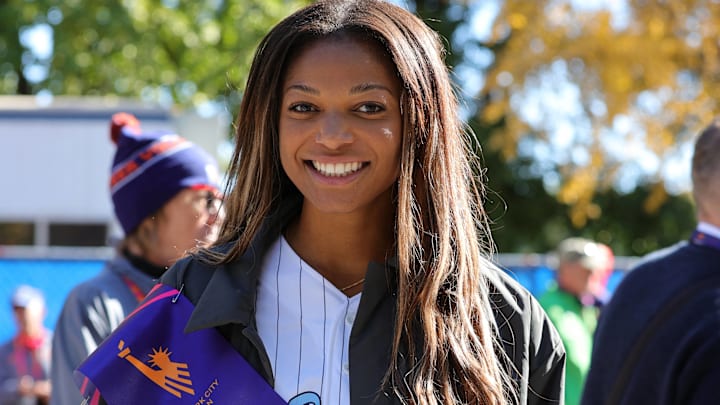Five-Time Olympic Medalist Gabby Thomas as 2024 New York City Marathon Grand Marshal celebrates after racing through the streets of New York City.