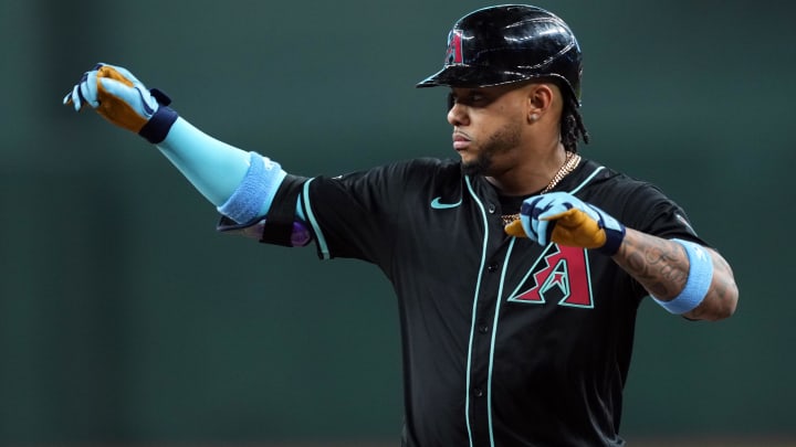 Jun 16, 2024; Phoenix, Arizona, USA; Arizona Diamondbacks second base Ketel Marte (4) reacts after hitting a single against the Chicago White Sox during the first inning at Chase Field. Mandatory Credit: Joe Camporeale-USA TODAY Sports