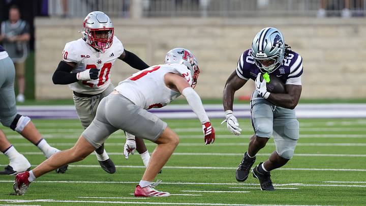 Sep 5, 2026; Manhattan, Kansas, USA; Kansas State Wildcats running back Rodney Fields Jr. (20) tries to run by Nicholls State Colonels defensive back Gavin Duplechin (23) during the second quarter at Bill Snyder Family Football Stadium. Mandatory Credit: Scott Sewell-Imagn Images Sep 5, 2026; Manhattan, Kansas, USA; Kansas State Wildcats running back Rodney Fields Jr. (20) tries to run by Nicholls State Colonels defensive back Gavin Duplechin (23) during the second quarter at Bill Snyder Family Football Stadium. Mandatory Credit: Scott Sewell-Imagn Images