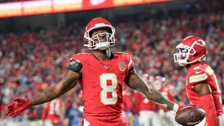 Dec 8, 2024; Kansas City, Missouri, USA; Kansas City Chiefs wide receiver DeAndre Hopkins (8) celebrates after scoring against the Los Angeles Chargers during the first half at GEHA Field at Arrowhead Stadium. Mandatory Credit: Denny Medley-Imagn Images