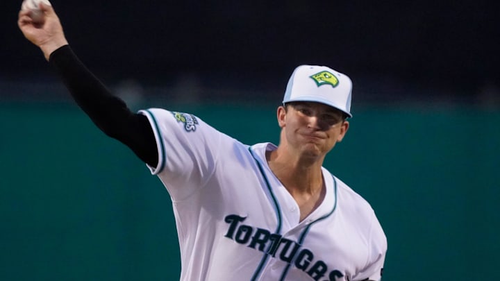 Carson Spiers throws a pitch