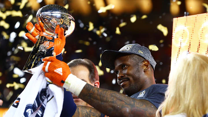 Feb 7, 2016; Santa Clara, CA, USA; Denver Broncos linebacker Von Miller (58) celebrates with the Vince Lombardi Trophy after defeating the Carolina Panthers in Super Bowl 50 at Levi's Stadium. Mandatory Credit: Mark J. Rebilas-Imagn Images
