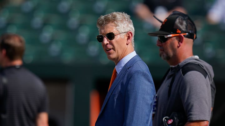Jul 27, 2022; Baltimore, Maryland, USA; Baltimore Orioles general manager Mike Elias reacts on the field before the game between the Baltimore Orioles and the Tampa Bay Rays at Oriole Park at Camden Yards.