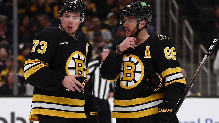 Mar 24, 2026; Boston, Massachusetts, USA; Boston Bruins defenseman Charlie McAvoy (73) talks with right wing David Pastrnak (88) during the third period against the Toronto Maple Leafs at TD Garden. Mandatory Credit: Winslow Townson-Imagn Images
