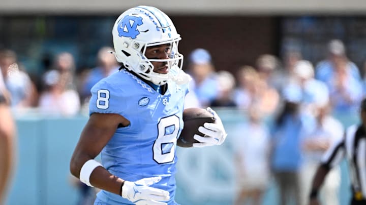 Sep 21, 2024; Chapel Hill, North Carolina, USA; North Carolina Tar Heels wide receiver Kobe Paysour (8) with the ball in the first quarter at Kenan Memorial Stadium. Mandatory Credit: Bob Donnan-Imagn Images