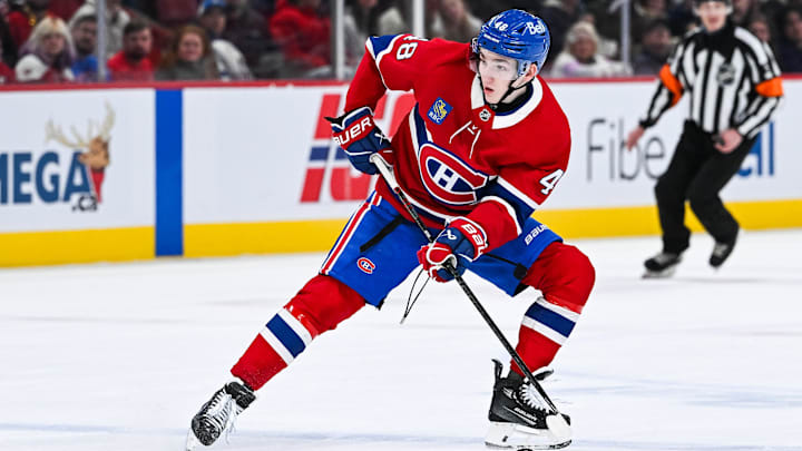 Jan 28, 2025; Montreal, Quebec, CAN; Montreal Canadiens defenseman Lane Hutson (48) plays the puck against the Winnipeg Jets during the second period at Bell Centre. Mandatory Credit: David Kirouac-Imagn Images