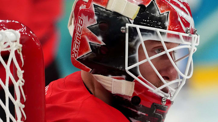 Feb 18, 2026; Milan, Italy; Jordan Binnington of Canada looks on in a men's ice hockey quarterfinal during the Milano Cortina 2026 Olympic Winter Games at Milano Santagiulia Ice Hockey Arena. Mandatory Credit: Amber Searls-Imagn Images