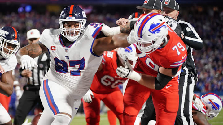 Oct 15, 2023; Orchard Park, New York, USA; New York Giants defensive tackle Dexter Lawrence II (97) and Buffalo Bills offensive tackle Spencer Brown (79) shove one another after a play Oct 15, 2023; Orchard Park, New York, USA; New York Giants defensive tackle Dexter Lawrence II (97) and Buffalo Bills offensive tackle Spencer Brown (79) shove one another after a play