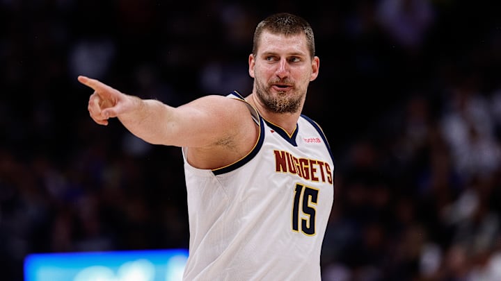 Oct 13, 2024; Denver, Colorado, USA; Denver Nuggets center Nikola Jokic (15) reacts after a play in the second quarter against the Phoenix Suns at Ball Arena. Mandatory Credit: Isaiah J. Downing-Imagn Images