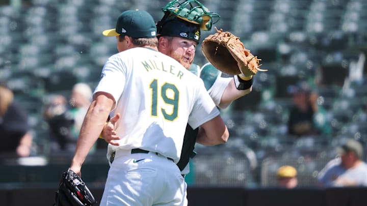 May 1, 2024; Oakland, California, USA; Oakland Athletics relief pitcher Mason Miller (19) hugs