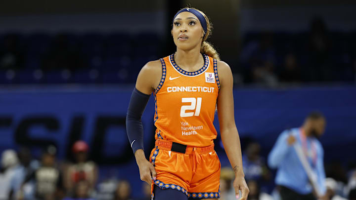 Jun 12, 2024; Chicago, Illinois, USA; Connecticut Sun guard DiJonai Carrington (21) looks on during the first half of a basketball game against the Chicago Sky at Wintrust Arena. Mandatory Credit: Kamil Krzaczynski-Imagn Images