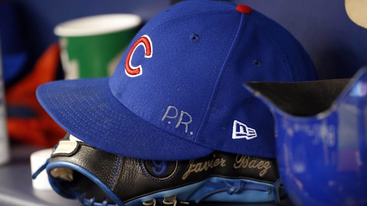 Sep 20, 2017; St. Petersburg, FL, USA; A detailed view of Chicago Cubs third baseman Javier Baez (9) (not pictured) hat and glove with the initials P.R. for his home country Puerto Rico against the Tampa Bay Rays at Tropicana Field.