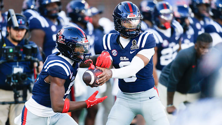 Dec 20, 2025; Oxford, MS, USA; Mississippi Rebels quarterback Trinidad Chambliss (6) and running back Kewan Lacy (5) warm up prior to a game against the Tulane Green Wave at Vaught-Hemingway Stadium. Mandatory Credit: Petre Thomas-Imagn Images