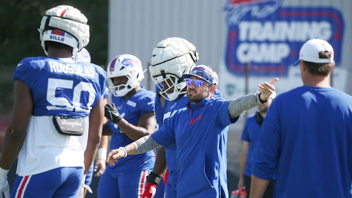 Bills defensive coordinator Bobby Babich talks with the defensive line during training camp. Bills defensive coordinator Bobby Babich talks with the defensive line during training camp.
