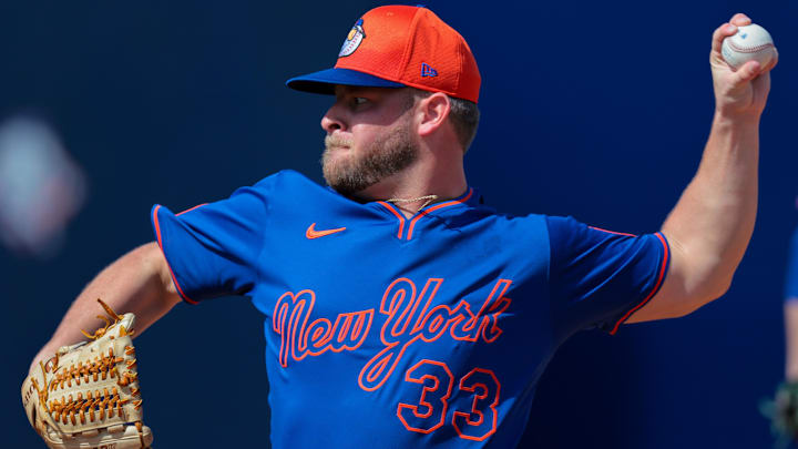 Feb 15, 2025; Port St. Lucie, FL, USA; New York Mets pitcher A.J. Minter (33) pitches during a spring training workout at Clover Park. Mandatory Credit: Sam Navarro-Imagn Images