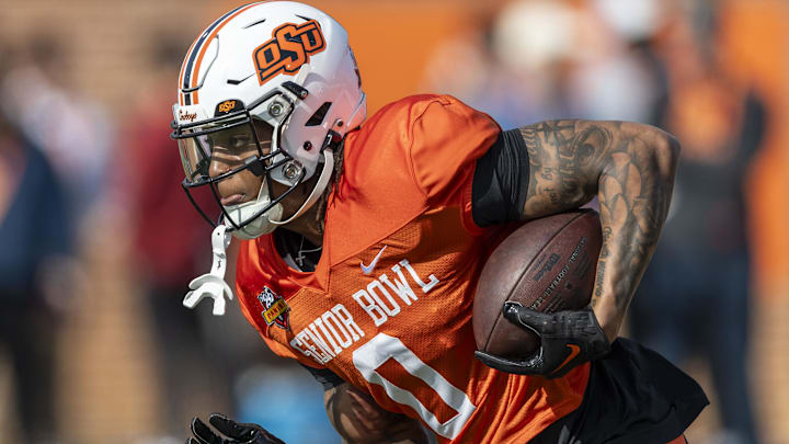 Jan 29, 2025; Mobile, AL, USA; National team running back Ollie Gordon II of Oklahoma State (0) runs the ball during Senior Bowl practice for the National team at Hancock Whitney Stadium. Mandatory Credit: Vasha Hunt-Imagn Images Jan 29, 2025; Mobile, AL, USA; National team running back Ollie Gordon II of Oklahoma State (0) runs the ball during Senior Bowl practice for the National team at Hancock Whitney Stadium. Mandatory Credit: Vasha Hunt-Imagn Images