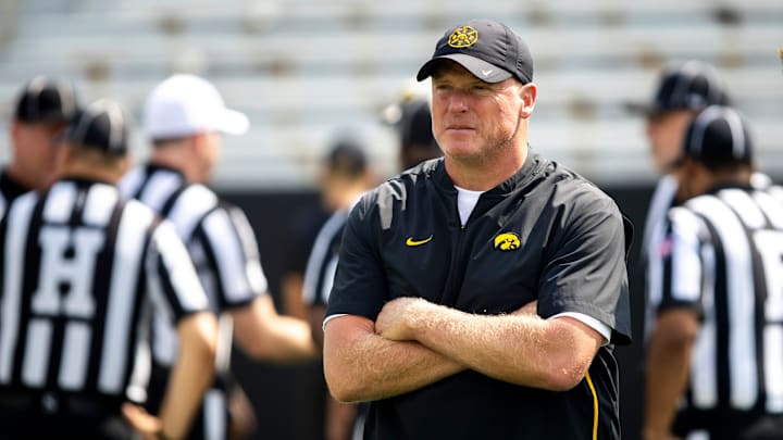 Aug 9, 2025; Iowa offensive line coach George Barnett looks on during the Hawkeyes Kids Day NCAA football open practice at Kinnick Stadium in Iowa City, Iowa. Mandatory Credit: Joseph Cress for the Des Moines Register