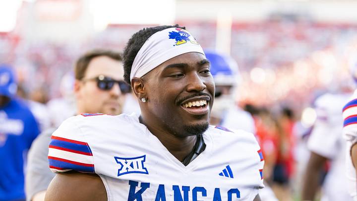 Nov 8, 2025; Tucson, Arizona, USA; Kansas Jayhawks quarterback Jalon Daniels (6) against the Arizona Wildcats at Arizona Stadium. Mandatory Credit: Mark J. Rebilas-Imagn Images