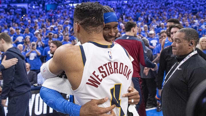 May 18, 2025; Oklahoma City, Oklahoma, USA; Oklahoma City Thunder guard Shai Gilgeous-Alexander (2) and Denver Nuggets guard Russell Westbrook (4) hug after their game seven of the second round for the 2025 NBA Playoffs at Paycom Center. Mandatory Credit: Alonzo Adams-Imagn Images