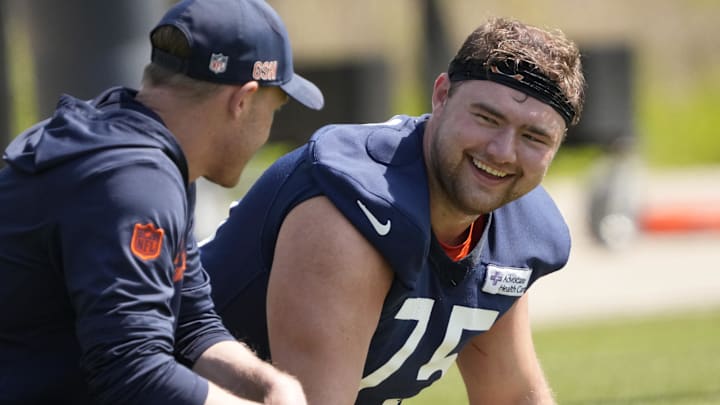 Ozzy Trapilo talks with Bears coach Ben Johnson at rookie camp. Now Trapilo tests his left tackle skills against veterans at OTAs.