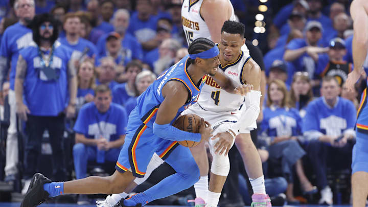 Russell Westbrook guards Shai Gilgeous-Alexander during Game 7 of the Nuggets loss to the Thunder. 