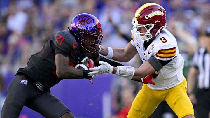 Nov 8, 2025; Fort Worth, Texas, USA; TCU Horned Frogs safety Bud Clark (21) intercepts a pass intended for Iowa State Cyclones wide receiver Brett Eskildsen (9) during the first half at Amon G. Carter Stadium. 