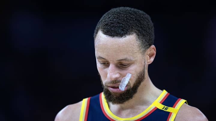 Mar 13, 2025; San Francisco, California, USA; Golden State Warriors guard Stephen Curry (30) awaits the resumption of play against the Sacramento Kings during the third quarter at Chase Center. Mandatory Credit: D. Ross Cameron-Imagn Images