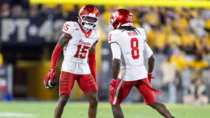 Oct 25, 2025; Tempe, Arizona, USA; Houston Cougars defensive back Will James (15) celebrates a fumble recovery with Kentrell Webb (8) against the Arizona State Sun Devils in the first half at Mountain America Stadium. Mandatory Credit: Mark J. Rebilas-Imagn Images Oct 25, 2025; Tempe, Arizona, USA; Houston Cougars defensive back Will James (15) celebrates a fumble recovery with Kentrell Webb (8) against the Arizona State Sun Devils in the first half at Mountain America Stadium. Mandatory Credit: Mark J. Rebilas-Imagn Images