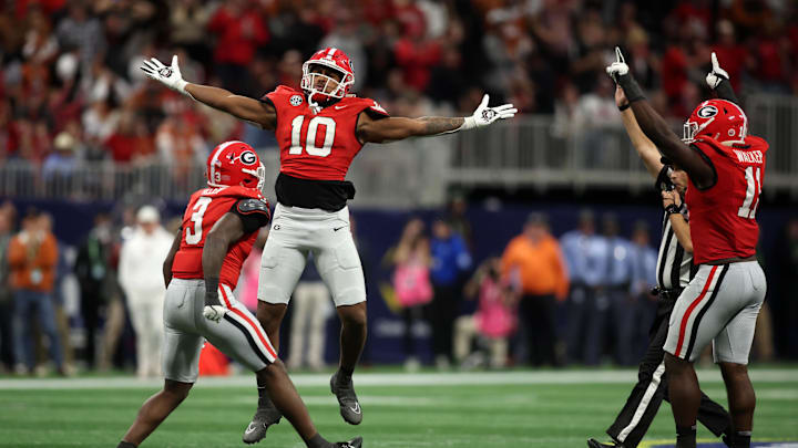 Dec 7, 2024; Atlanta, GA, USA; Georgia Bulldogs linebacker Damon Wilson II (10), linebacker Jalon Walker (11) and linebacker CJ Allen (3) react during the second half in the 2024 SEC Championship game at Mercedes-Benz Stadium. Mandatory Credit: Brett Davis-Imagn Images Dec 7, 2024; Atlanta, GA, USA; Georgia Bulldogs linebacker Damon Wilson II (10), linebacker Jalon Walker (11) and linebacker CJ Allen (3) react during the second half in the 2024 SEC Championship game at Mercedes-Benz Stadium. Mandatory Credit: Brett Davis-Imagn Images