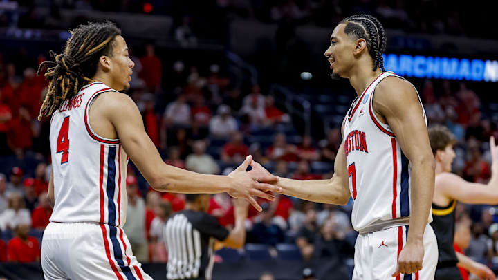 Mar 19, 2026; Oklahoma City, OK, USA; Houston Cougars center Cedric Lath (8) and Houston Cougars guard Kingston Flemings (4) high five during a first round game of the men's 2026 NCAA Tournament at Paycom Center. Mandatory Credit: Alonzo Adams-Imagn Images