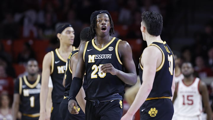 Mar 5, 2025; Norman, Oklahoma, USA; Missouri Tigers forward Mark Mitchell (25) reacts after a play against the Oklahoma Sooners during the second half at Lloyd Noble Center. Mandatory Credit: Alonzo Adams-Imagn Images Mar 5, 2025; Norman, Oklahoma, USA; Missouri Tigers forward Mark Mitchell (25) reacts after a play against the Oklahoma Sooners during the second half at Lloyd Noble Center. Mandatory Credit: Alonzo Adams-Imagn Images