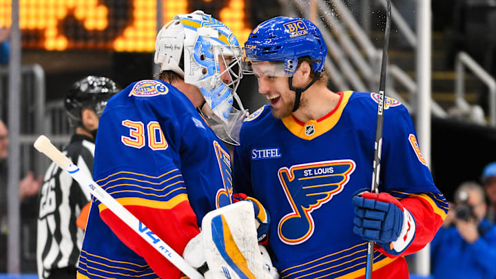 Jan 29, 2026; St. Louis, Missouri, USA; St. Louis Blues goaltender Joel Hofer (30) celebrates with defenseman Philip Broberg (6) after the Blues defeated the Florida Panthers at Enterprise Center. Mandatory Credit: Jeff Curry-Imagn Images