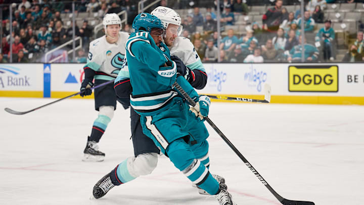 Jan 30, 2024; San Jose, California, USA; Seattle Kraken defenseman Jamie Oleksiak (24) defends